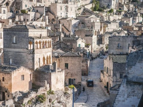 The ancient Sassi district of Matera in Basilicata during the day with stone buildings and streets