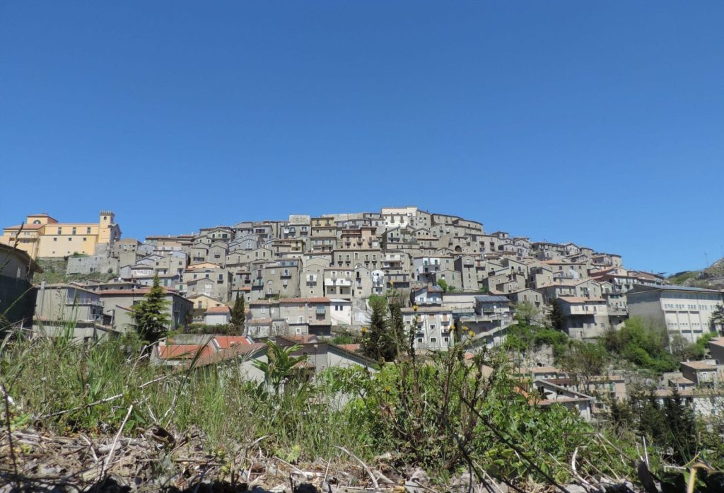 Panoramic view of the hilltop village of Castelgrande in Basilicata with terraced buildings