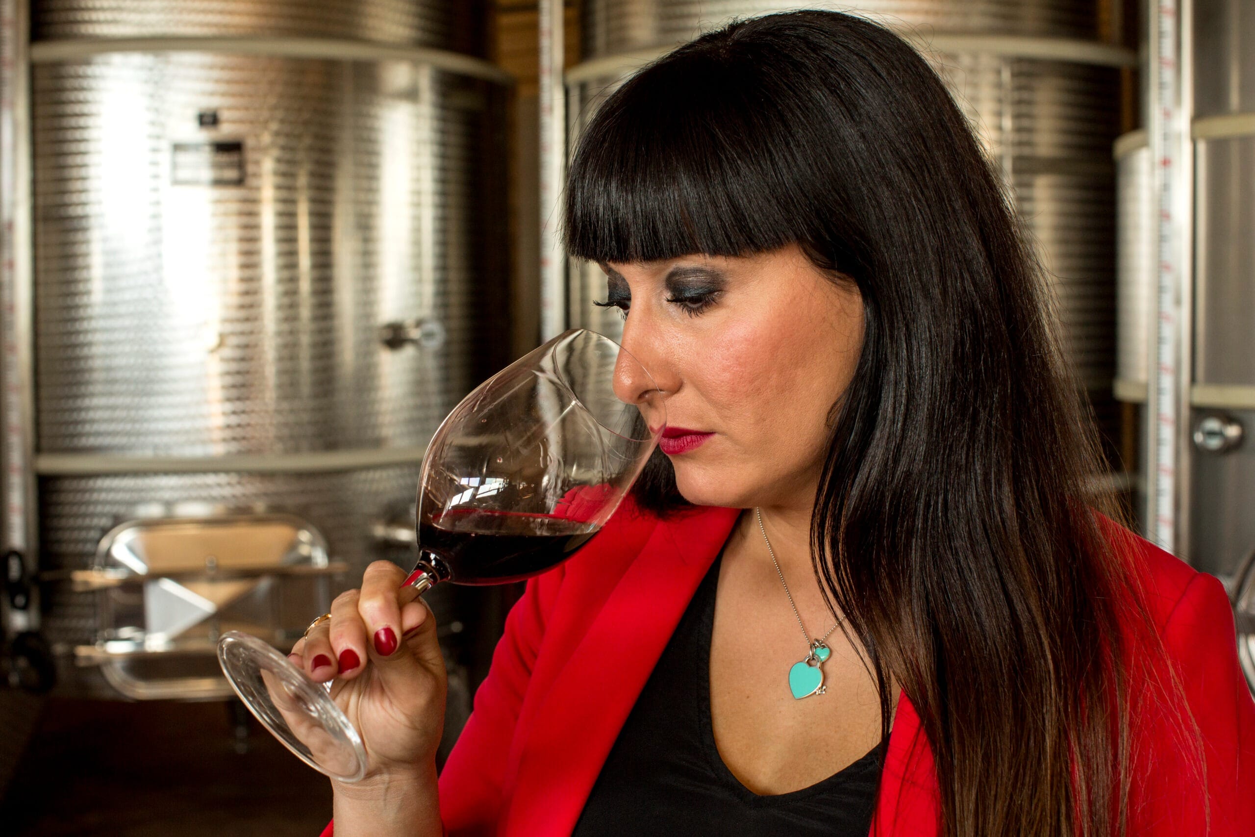 Elena Fucci tasting Aglianico del Vulture in her winery