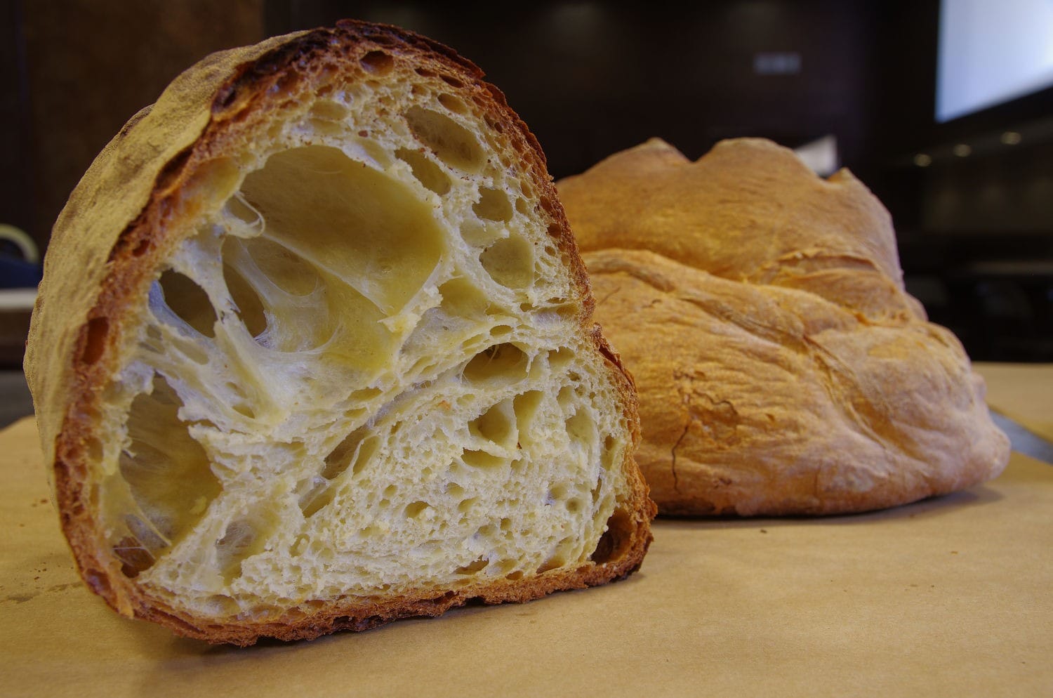 Cross-section of Pane di Matera showing golden crust and open crumb