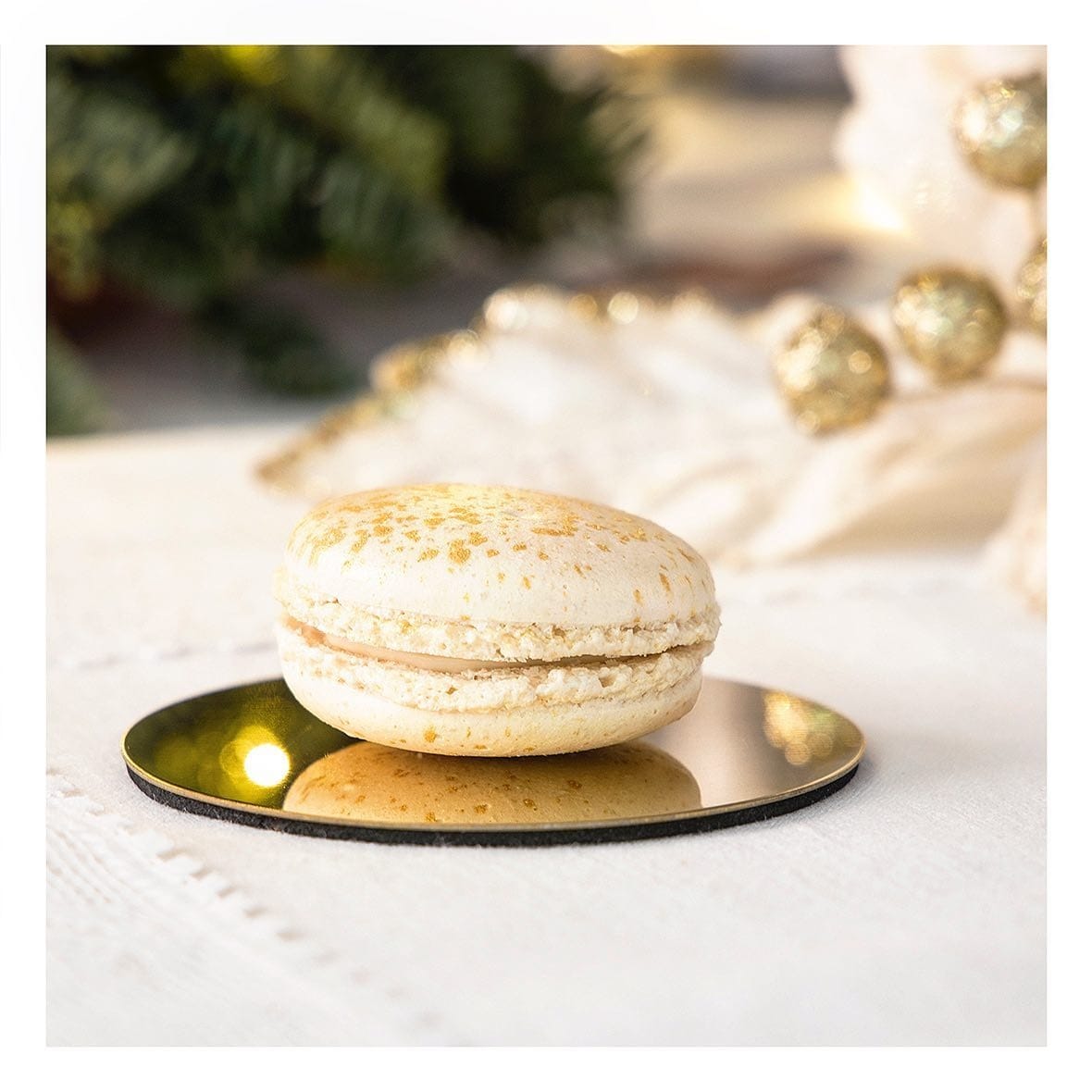 A macaron from Gelateria Caruso in Castelmezzano on a reflective surface