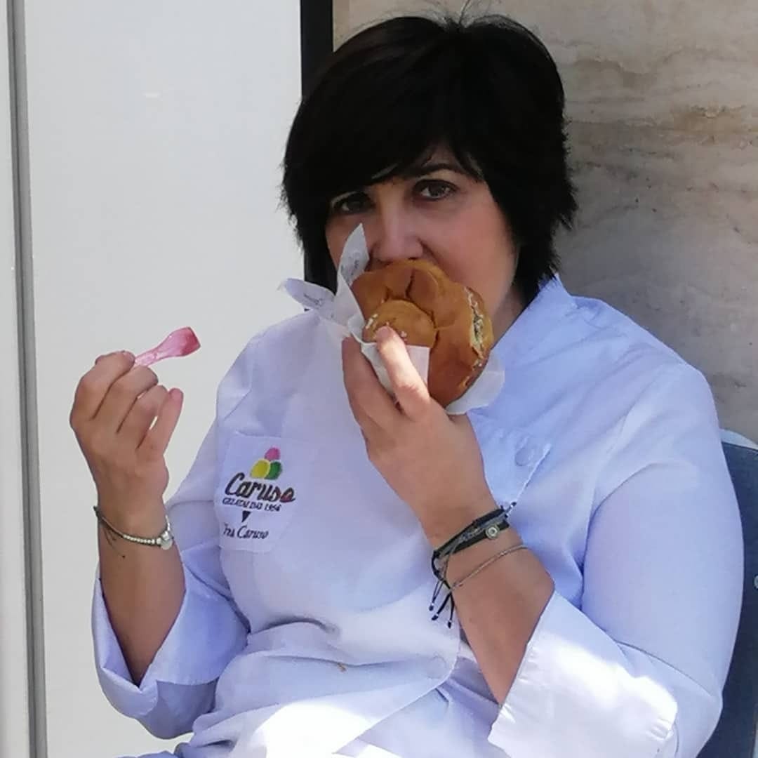 Pina Caruso eating gelato at Gelateria Caruso