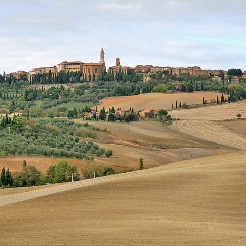 Hilltop town of Pienza overlooking rolling fields in the Val d'Orcia