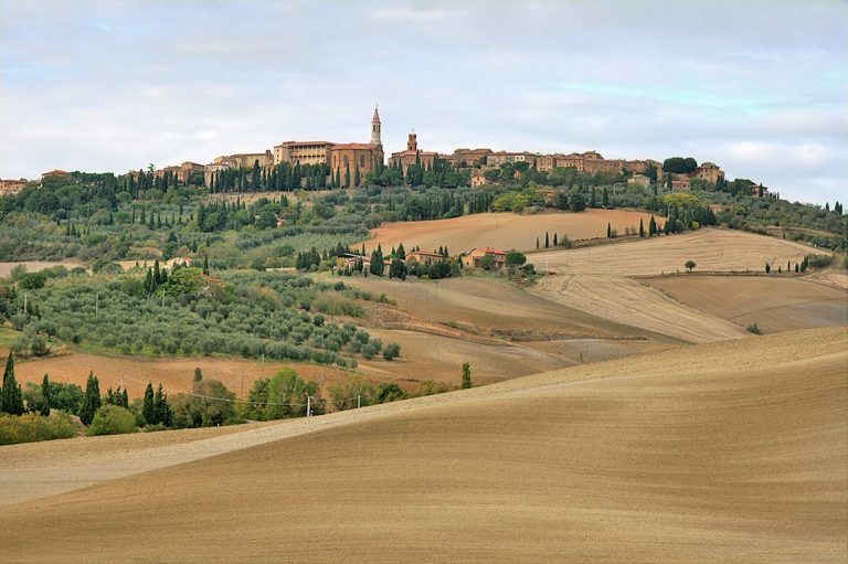 Hilltop town of Pienza overlooking rolling fields in the Val d'Orcia