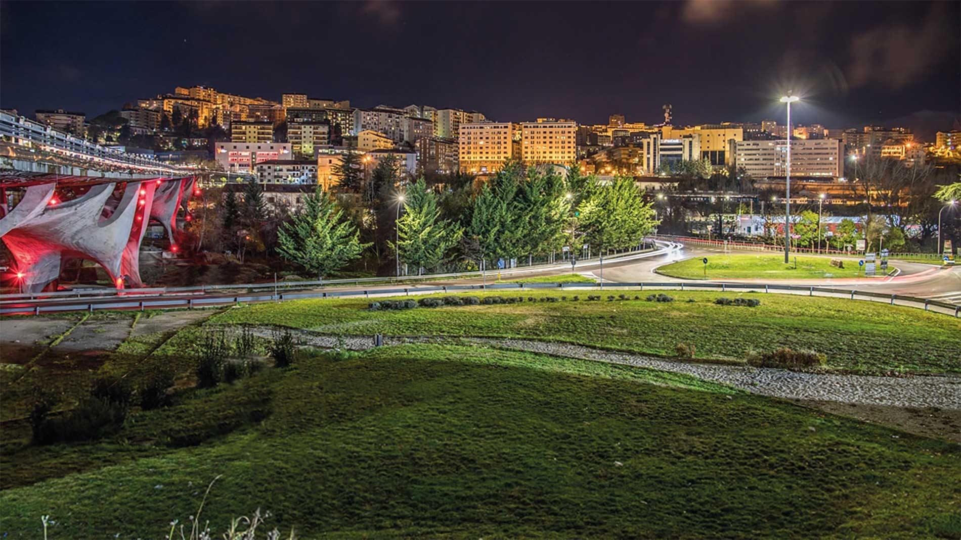 Night panoramic view of Potenza city on ridge above Basento Valley